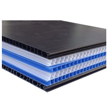 a stack of black and blue plastic sheets on top of each other